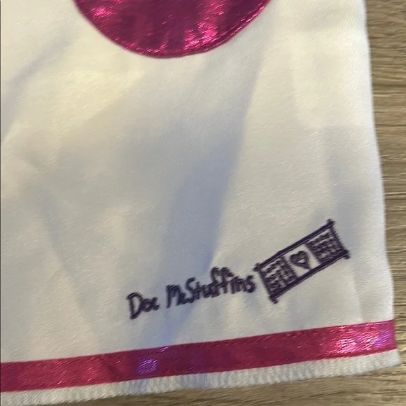 Disney Doc McStuffins 2T Girls Dr. Coat with Pink Accents - Picture 3 of 3